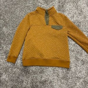 Snap up pullover sweatshirt.